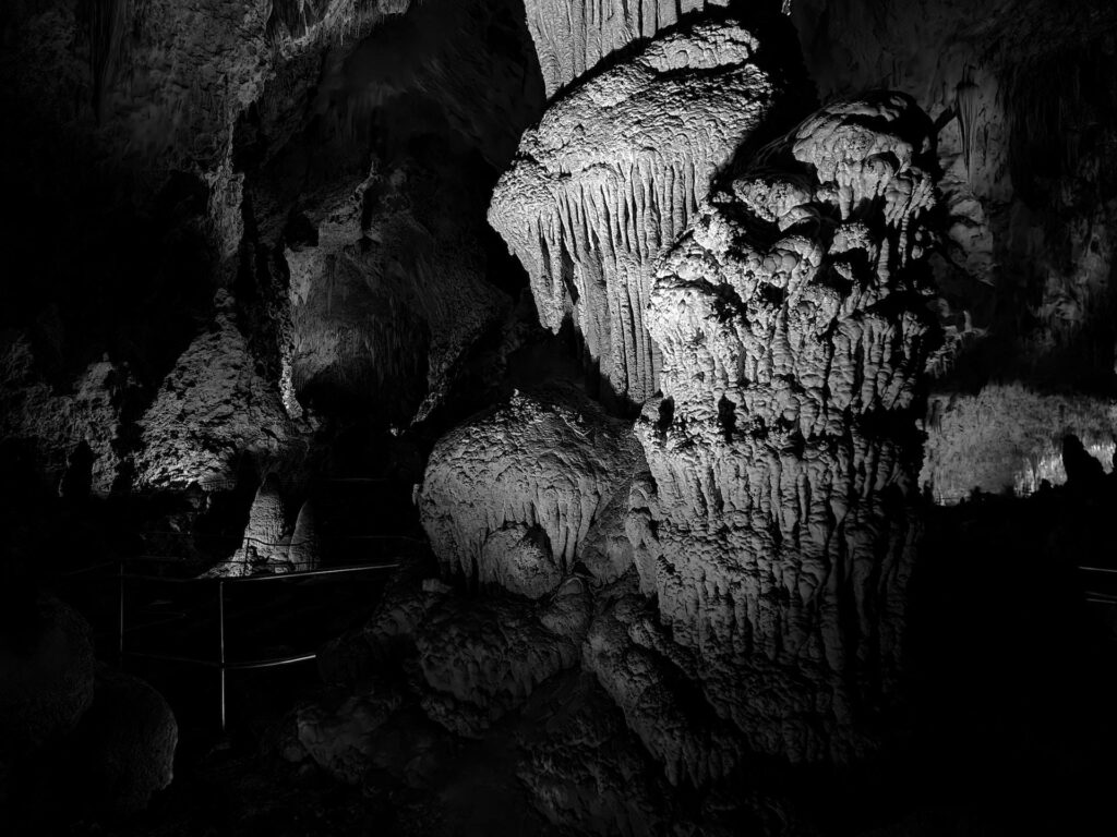 Mystical Shadows: Exploring Ancient Stonework in the Depths Wallpaper