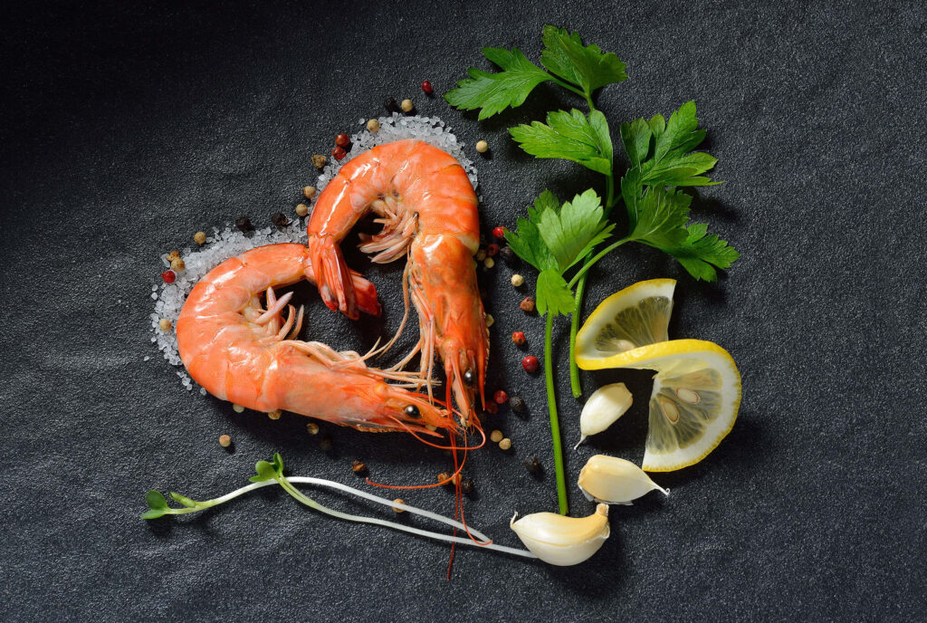 Gourmet Shrimp Heart Arrangement on Dark Background | Wallpaper