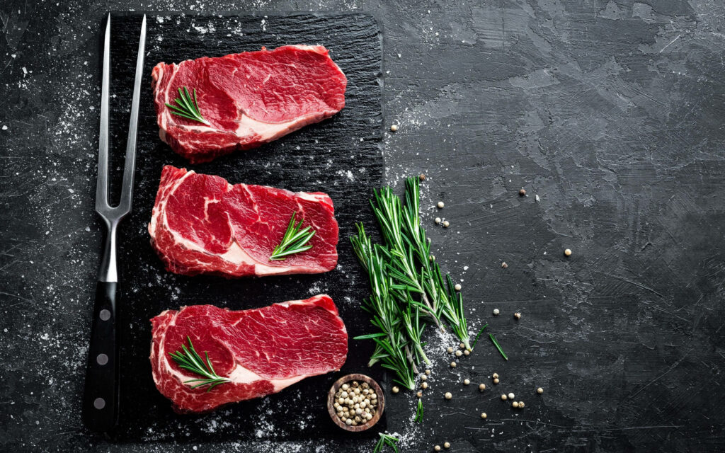 Elegant Kobe Beef Wallpaper: Fresh Steaks with Rosemary & Peppercorns