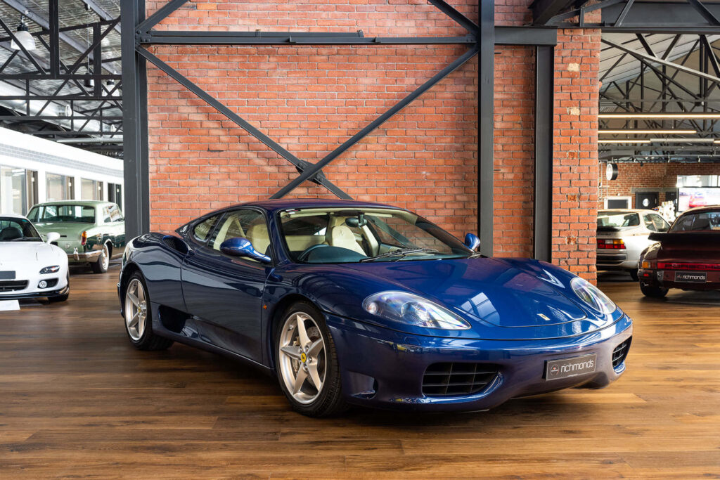 The Power and Poise of the Ferrari 360 Modena: An Exquisite Ride for Automotive Enthusiasts Wallpaper