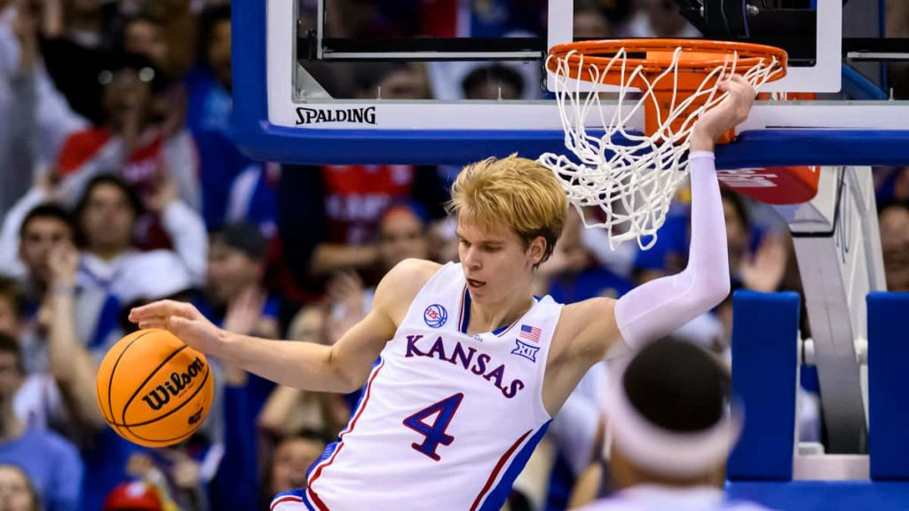 Kansas basketball wallpaper Gradey Dick dunk action Jayhawks white jersey court energy