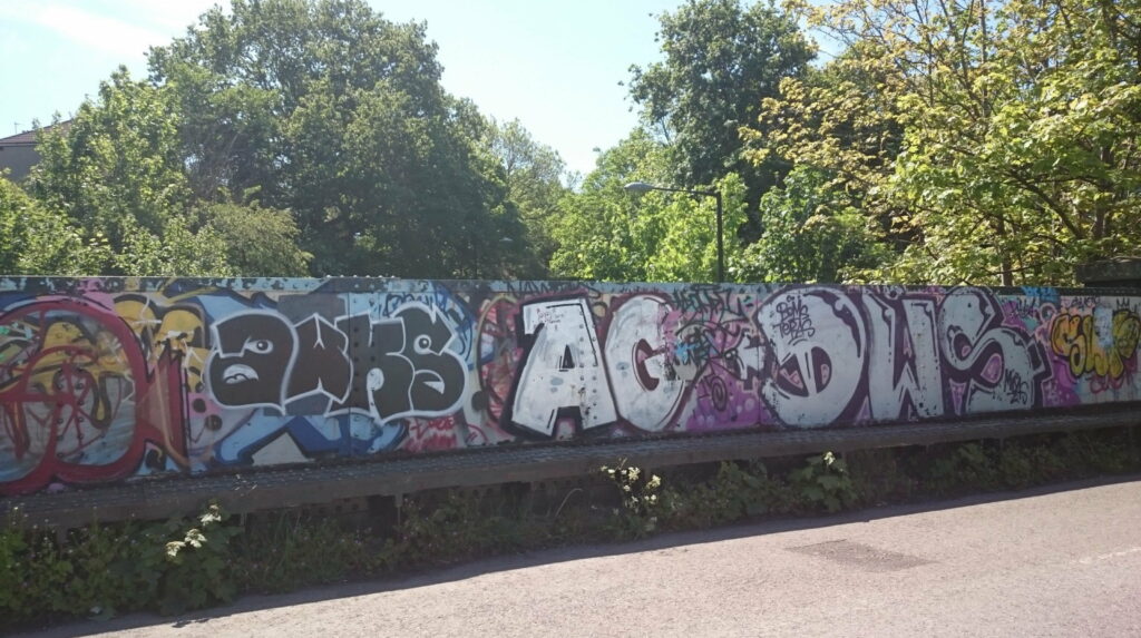 Graffiti Bridge: An Artistic Journey Along the Cycle Path Wallpaper
