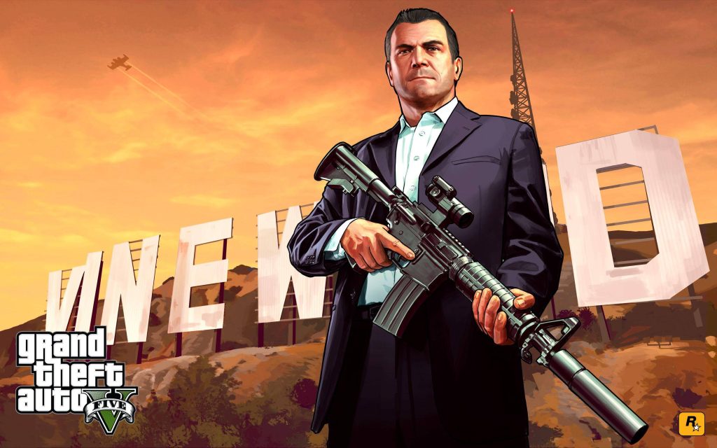 Michael De Santa GTA 5 wallpaper in Los Santos with Vinewood sign and golden sunset background