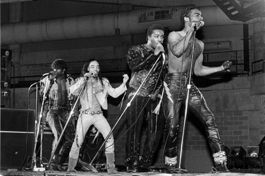 Dynamic Black and White Wallpaper of Grandmaster Flash & Furious Five