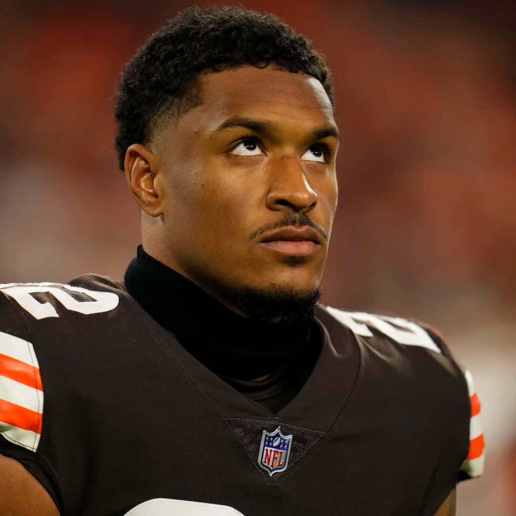 NFL safety Grant Delpit in Cleveland Browns jersey focused in professional portrait wallpaper