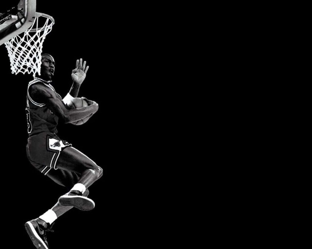 Iconic Dunk: Michael Jordan's Timeless Monochrome Slam Wallpaper