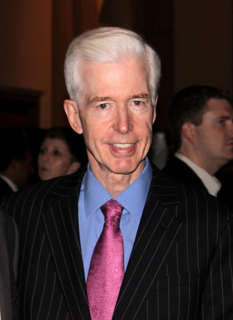 Portrait of former California Governor Gray Davis in formal suit and pink tie sharp wallpaper