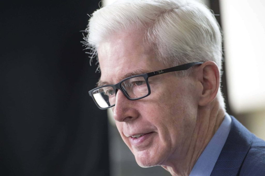 Close-up professional portrait of former California Governor Gray Davis in suit and glasses Wallpaper