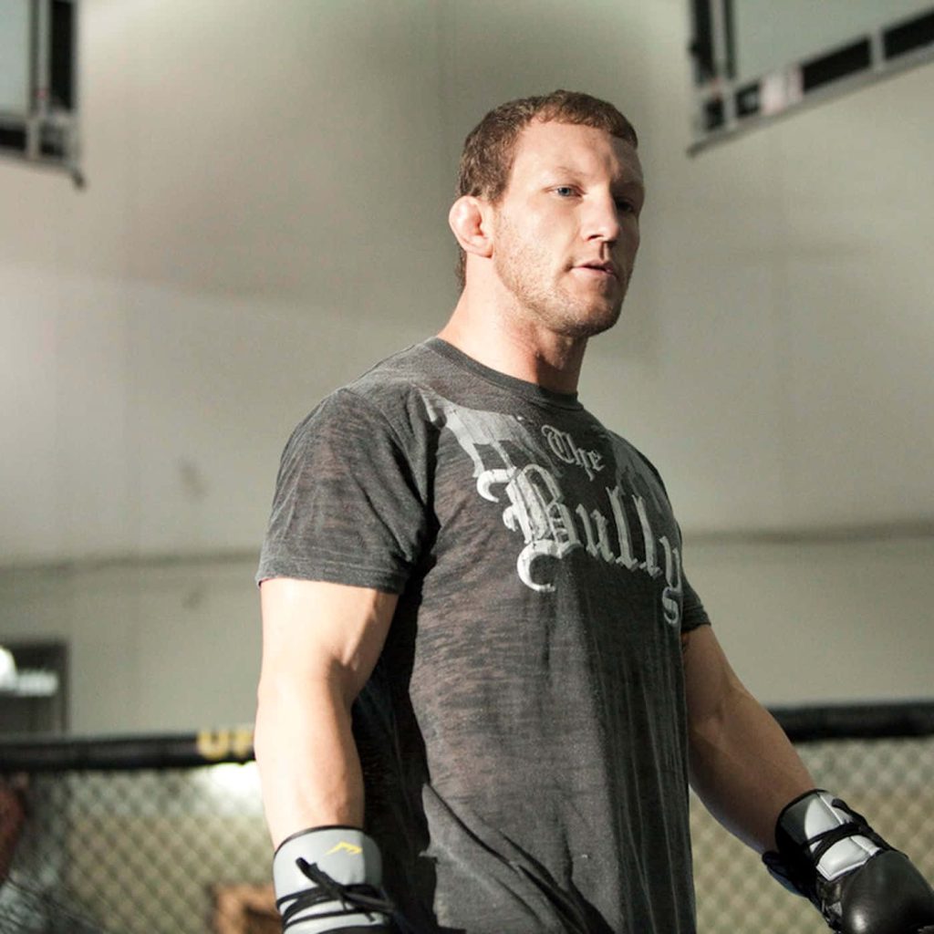 MMA fighter Gray Maynard in The Bully shirt training near octagon cage gym wallpaper background