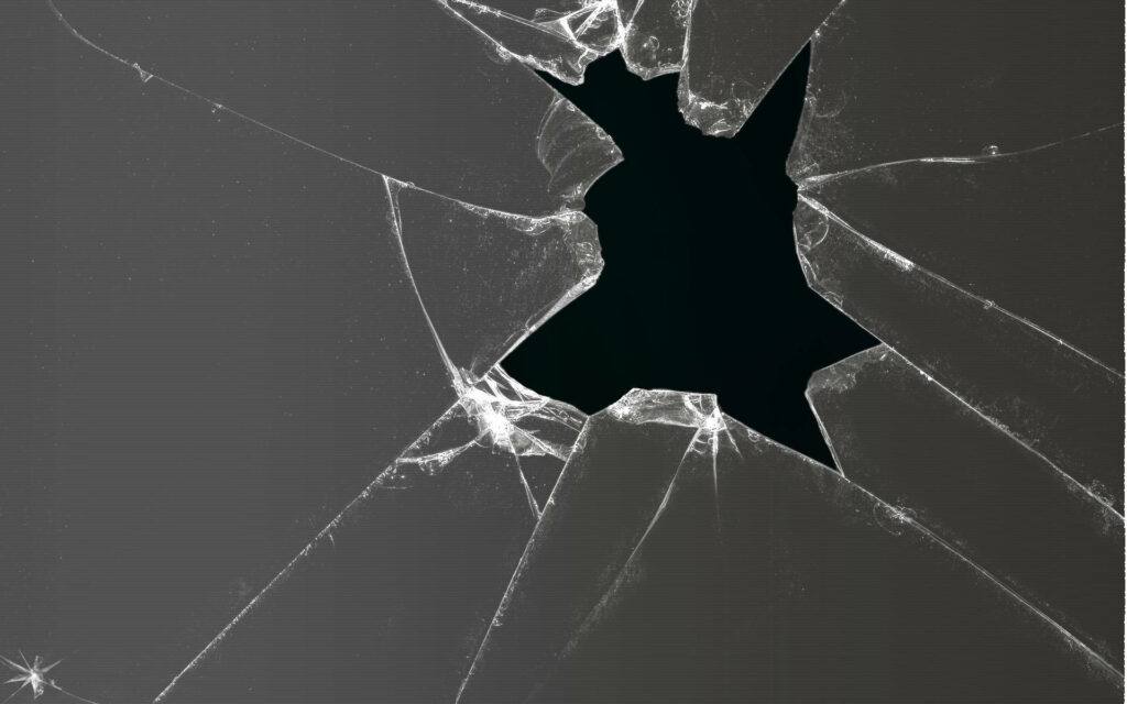Shattered Gray: A Stunning Wallpaper of Cracked Computer Screen