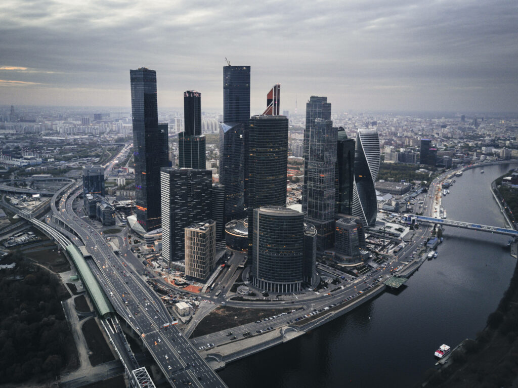 Grayscale aerial view of Moscow skyscrapers and riverside urban skyline modern architecture wallpaper