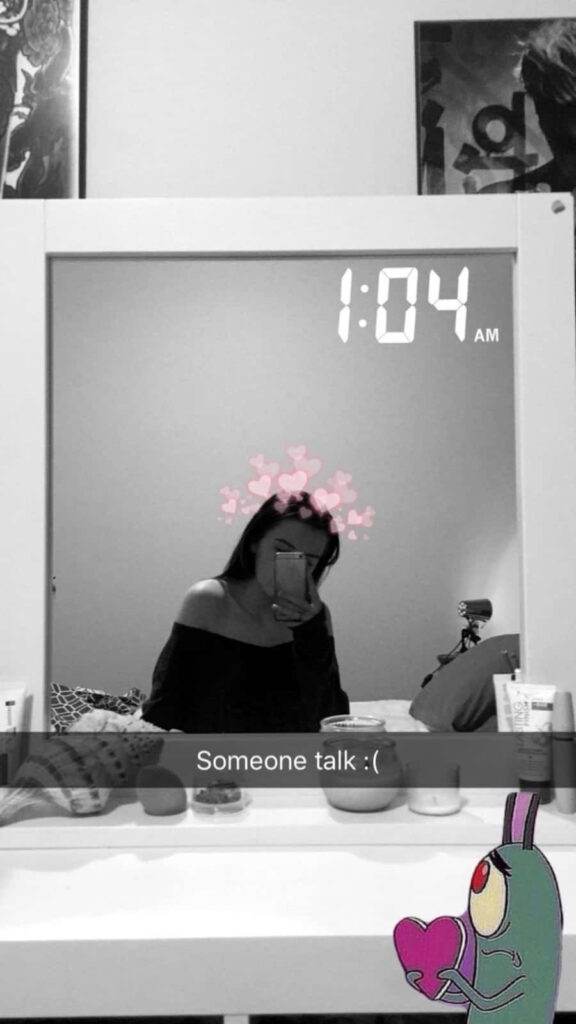 Grayscale Mirror Selfie with Colorful Hearts & Cartoon at 1:04 AM Wallpaper