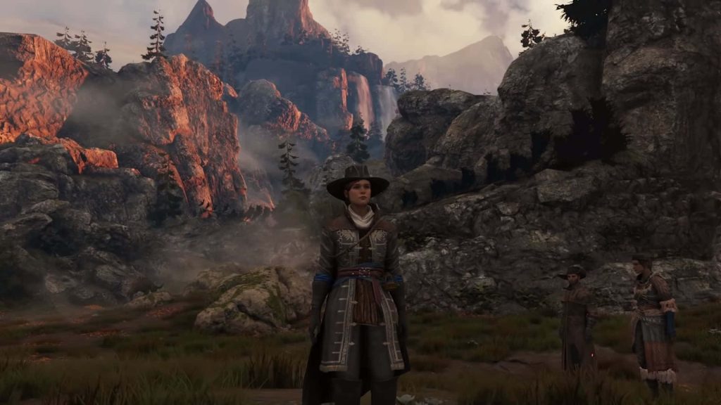De Sardet in GreedFall colonial attire stands by misty waterfall and mountains at sunset wallpaper