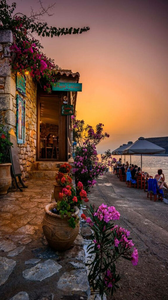 Greece's Captivating Sunset Over Limeni Village: Embrace Floral Serenity with this Stunning Flower Mobile Background! Wallpaper