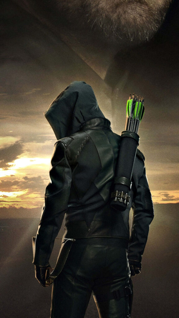 Green Arrow Wallpaper: Iconic Hooded Hero Against Dramatic Sunset