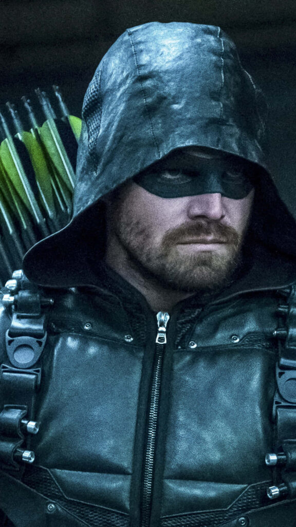 Green Arrow Wallpaper: Intense Hero in Sleek Black Outfit