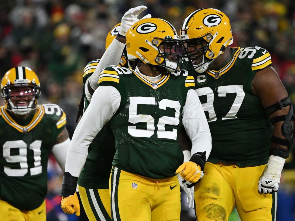 Green Bay Packers defense stars Rashan Gary Kenny Clark Preston Smith in action wallpaper