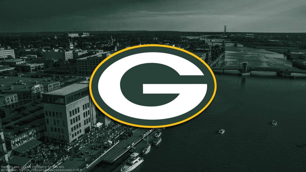Green Bay Packers logo over monochrome Green Bay Wisconsin riverfront aerial wallpaper background