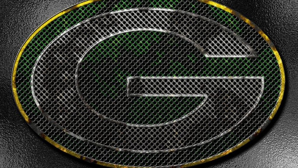 Green Bay Packers logo with metallic chain-link texture on dark industrial NFL football wallpaper