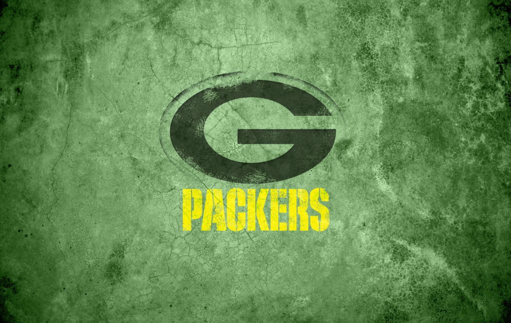 Green Bay Packers wallpaper with iconic G logo and yellow Packers text on textured green background
