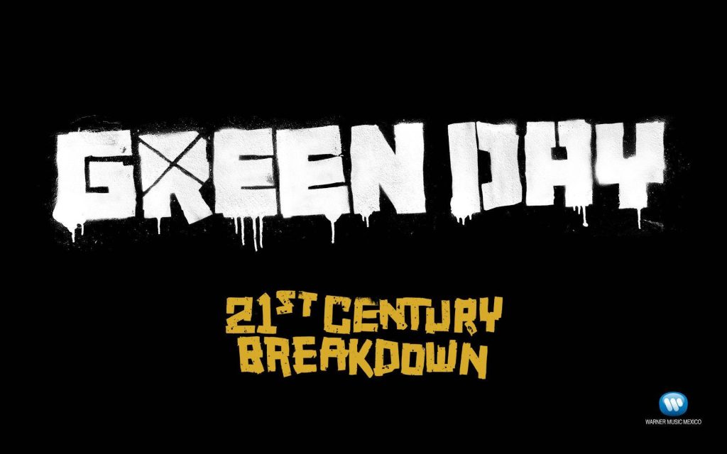 Green Day 21st Century Breakdown wallpaper with white graffiti and yellow stencil text on black background