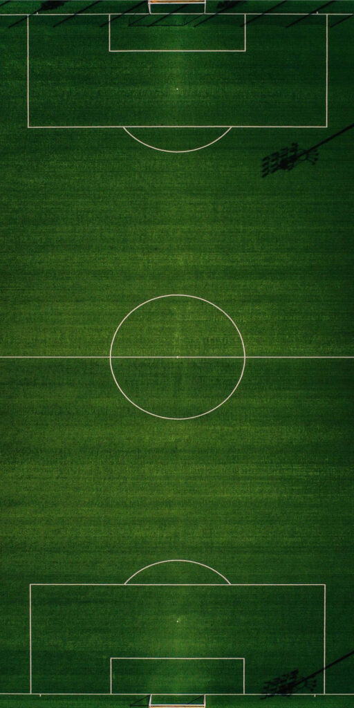Green Football Field Wallpaper: Athletic Atmosphere & Crisp Markings
