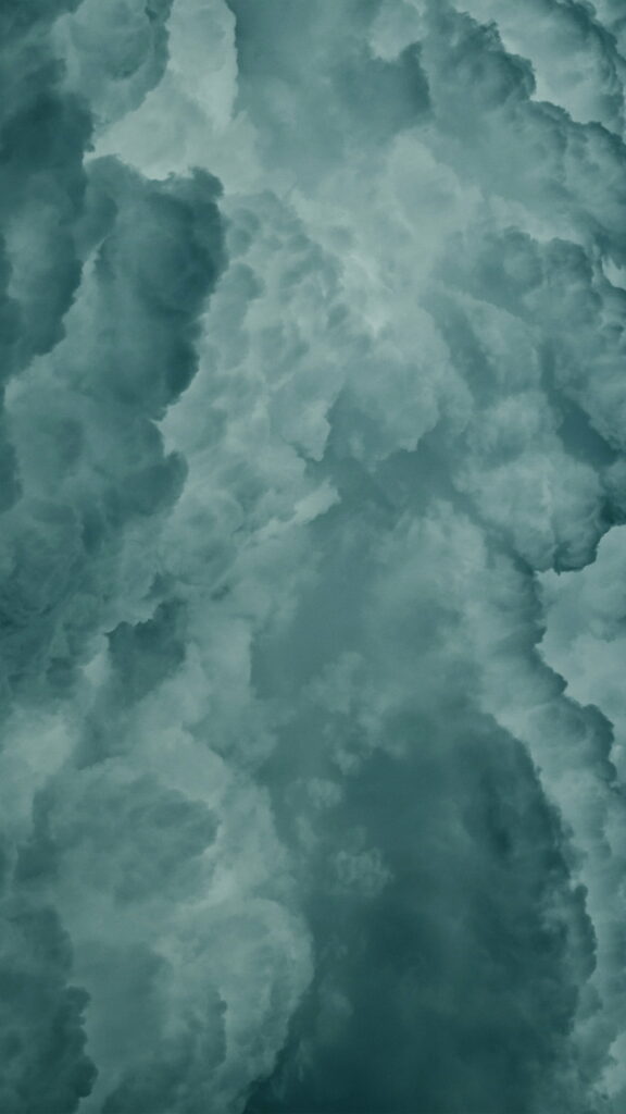 Serene Green Cloud Wallpaper: Minimalist HD Background for Phones