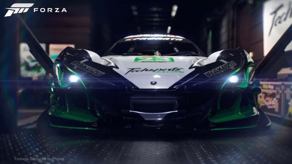 Green and white high-performance racing car with Forza logo in dimly lit garage wallpaper