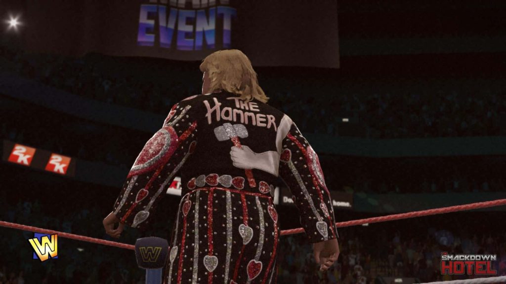 Greg The Hammer Valentine WWE 2K 3D model in ring wearing black heart-patterned robe wallpaper