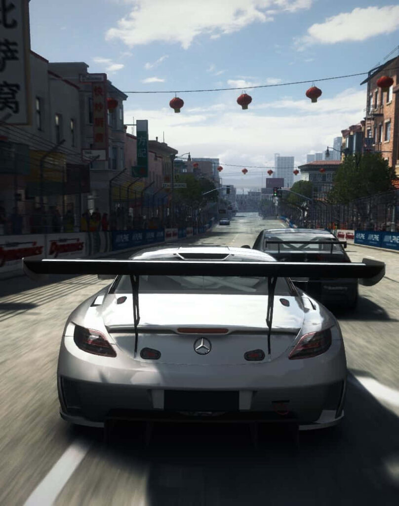 Sunny Street Race: Mercedes Speeding through Grid Autosport's White Cityscape Wallpaper