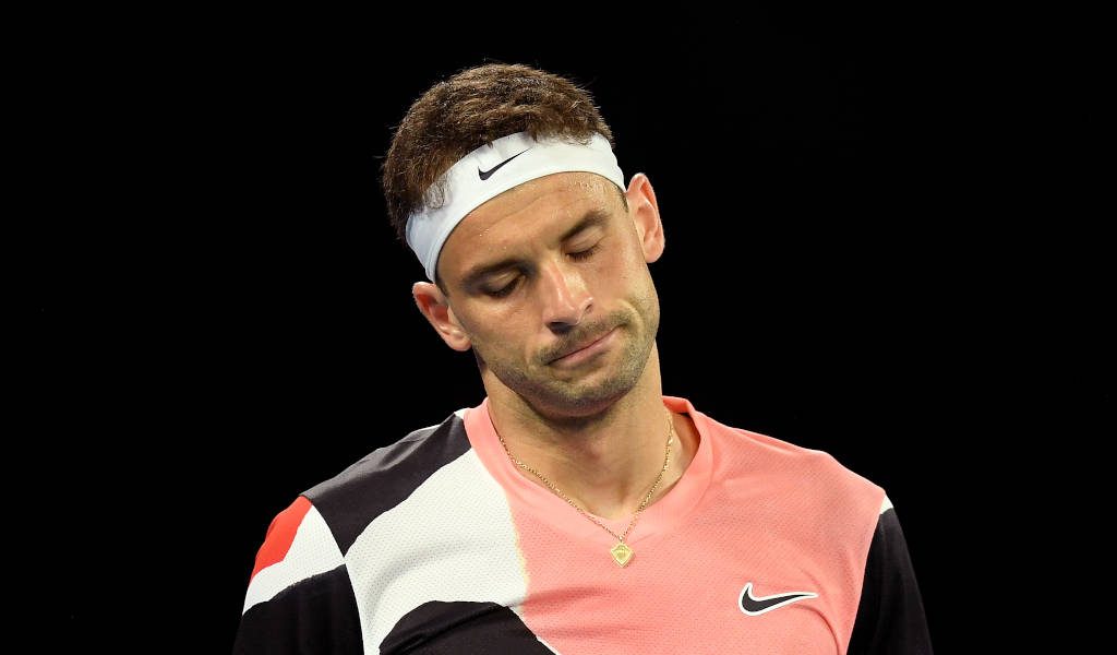 Grigor Dimitrov disappointed tennis player in Nike coral black outfit intense sports wallpaper background