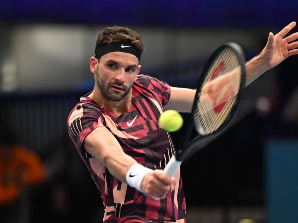 Grigor Dimitrov mid-swing tennis shot indoor court focused expression Nike gear wallpaper