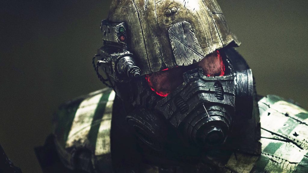 Close-up of gritty 4K Fallout 4 Ranger armor helmet with gas mask and glowing red eyes wallpaper