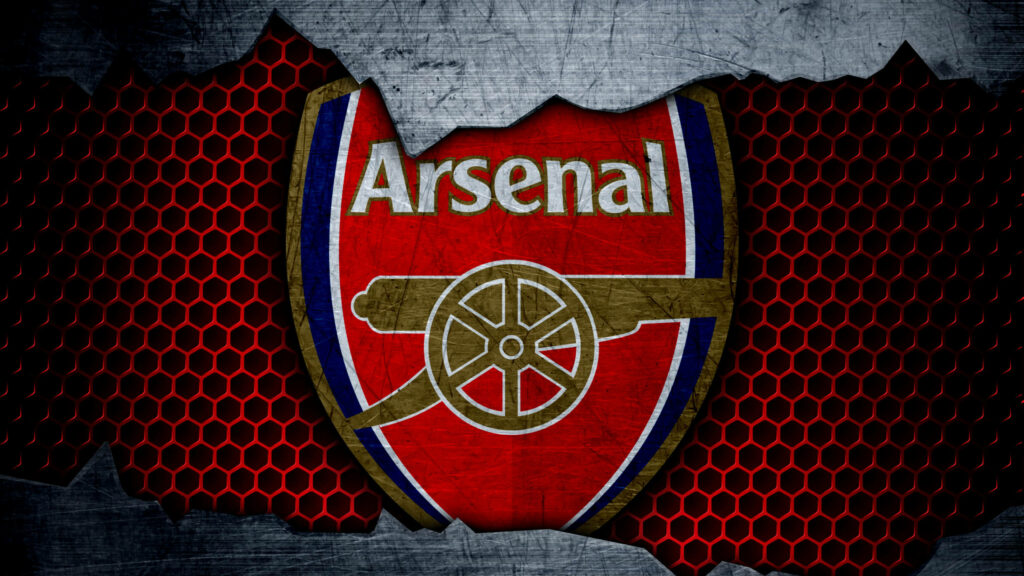 Shattered Arsenal: The Grunge Logo on a Red Soccer Net Wallpaper