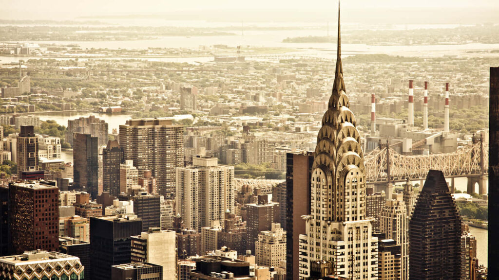 Ground-Level Gaze at the Majestic Empire State Building Wallpaper