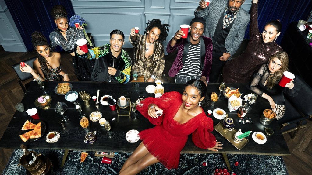 Grown-ish cast festive toast dinner table vibrant party stylish outfits high-angle wallpaper
