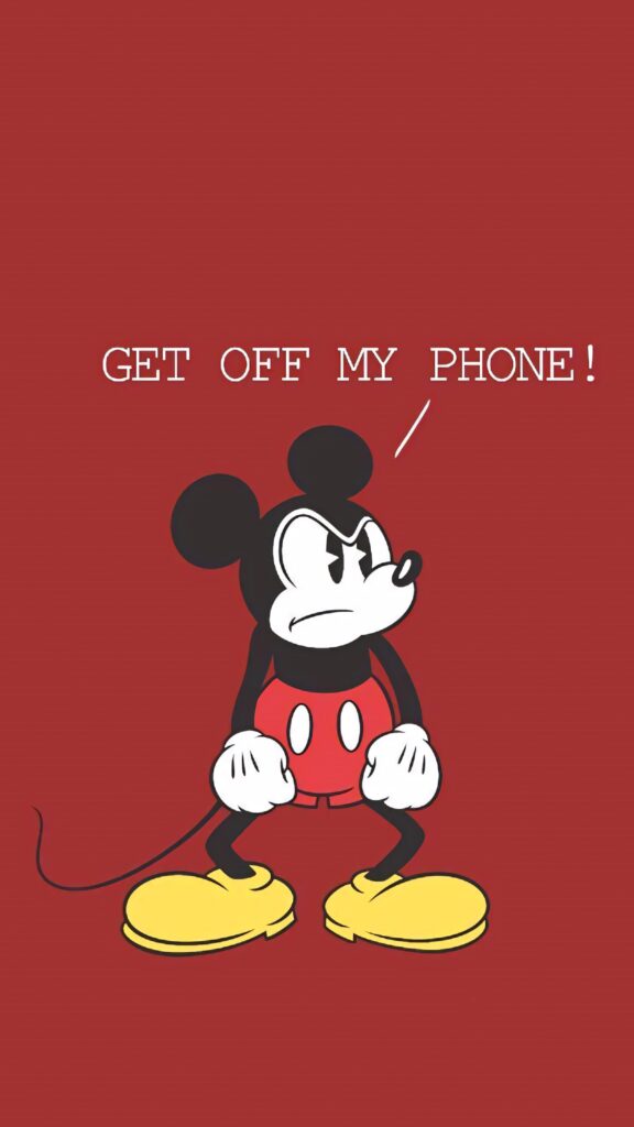 Grumpy Mickey Mouse wallpaper on red background with playful Get Off My Phone warning text