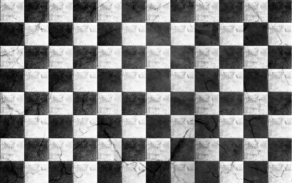 Grunge-Infused Chessboard: A Captivating Checkered Journey in Black and White Wallpaper