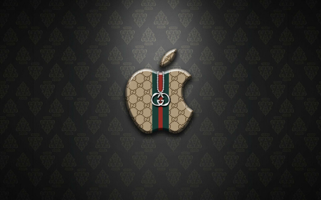Gucci-Inspired Apple Icon Shining on a Dark Black Background Wallpaper