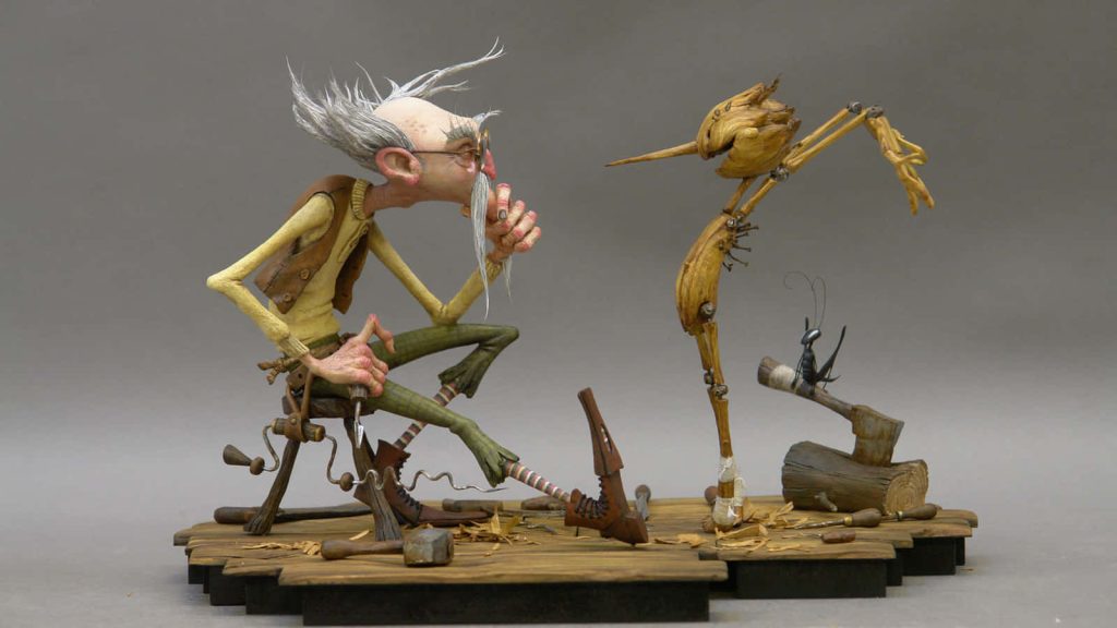 Detailed stop-motion maquette of Geppetto and Pinocchio with cricket in Guillermo del Toro’s style Wallpaper