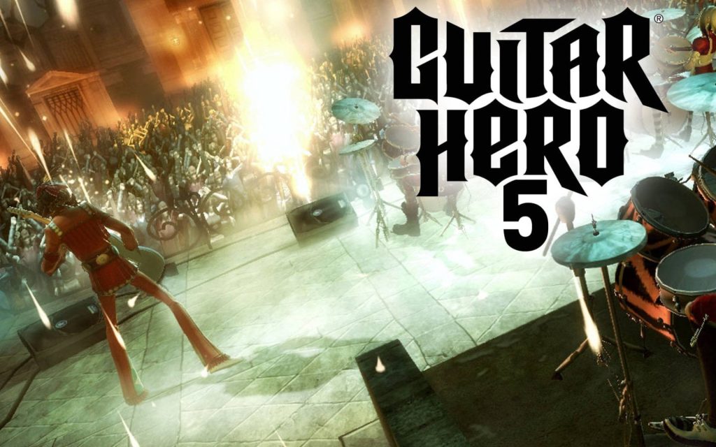Guitar Hero 5 wallpaper showing rock band performing live with drums and bright concert lights