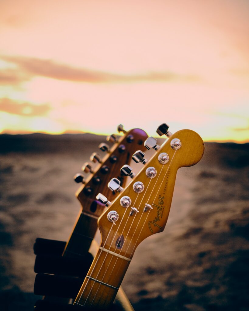 Guitar Necks Wallpaper: Fretboards & Sunset Serenity Background