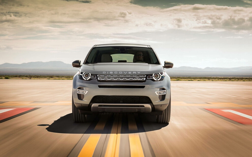 Gunmetal Gray Land Rover Discovery Wallpaper - Bold Design on Runway