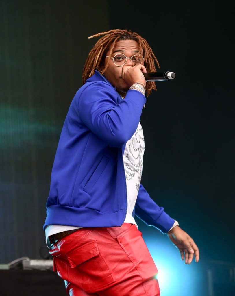 Gunna performing live in blue jacket red pants with dreadlocks at Openair Frauenfeld 2019 concert Wallpaper