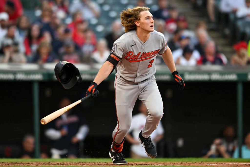 Baltimore Orioles Gunnar Henderson running after hit helmet off dynamic MLB baseball action wallpaper