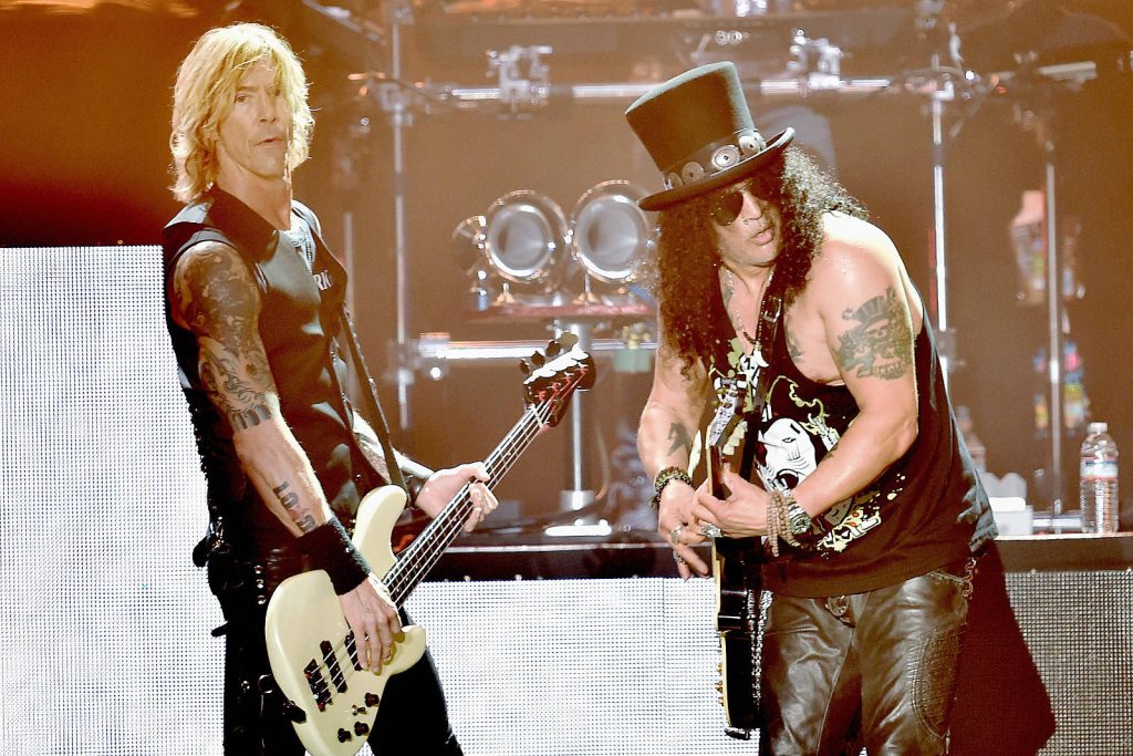 Guns N Roses Duff McKagan bass and Slash guitar live concert dynamic wallpaper background