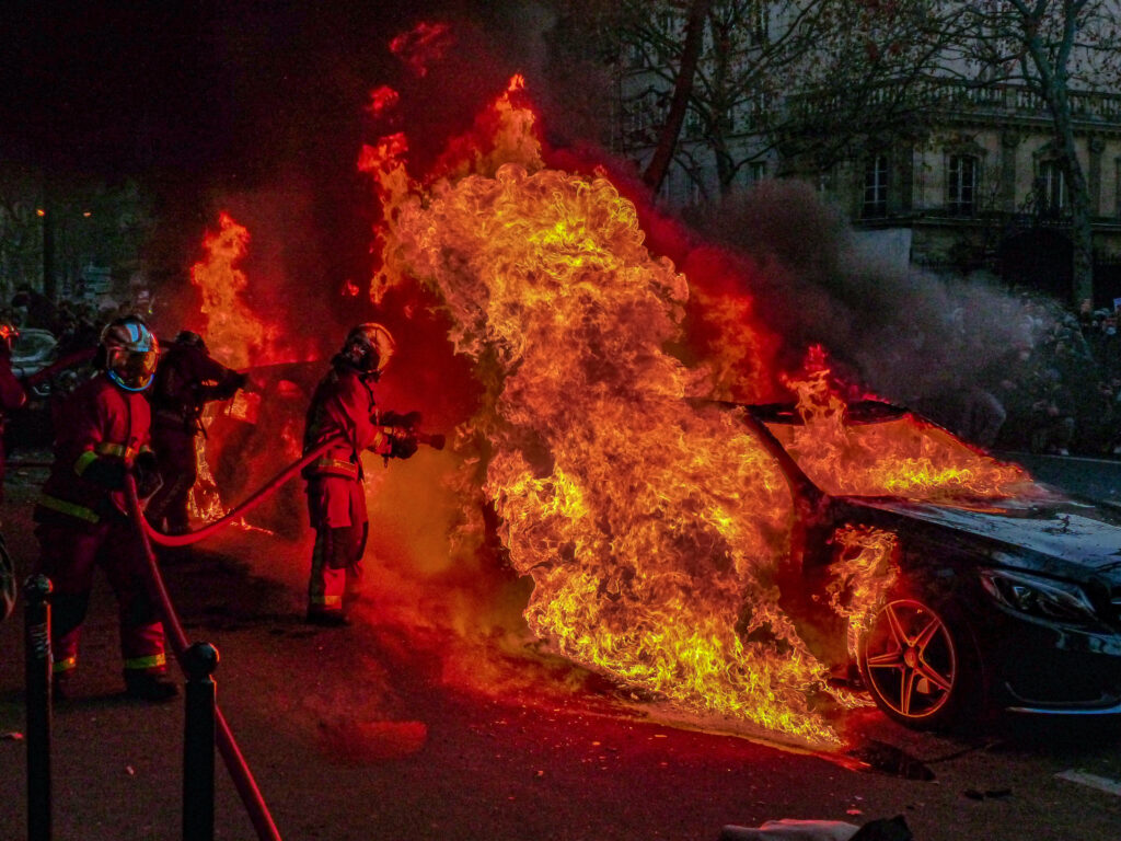 Fiery Car Crash Ignites an Intense Inferno, Brave Firefighters Battle to Extinguish Wallpaper