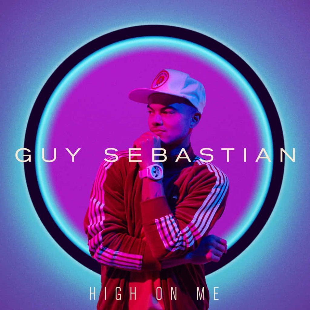 Guy Sebastian High on Me wallpaper red jacket neon purple background glowing blue ring light