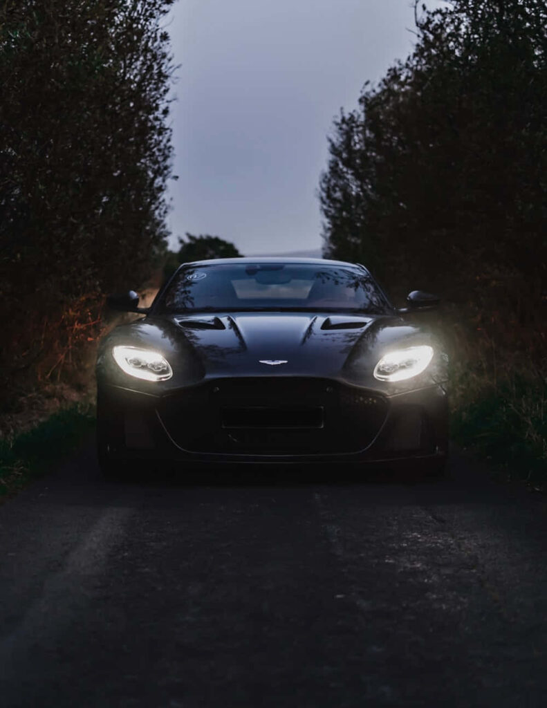 Illuminated Aston Martin Vantage HD Wallpaper: Sleek Design & Luxury