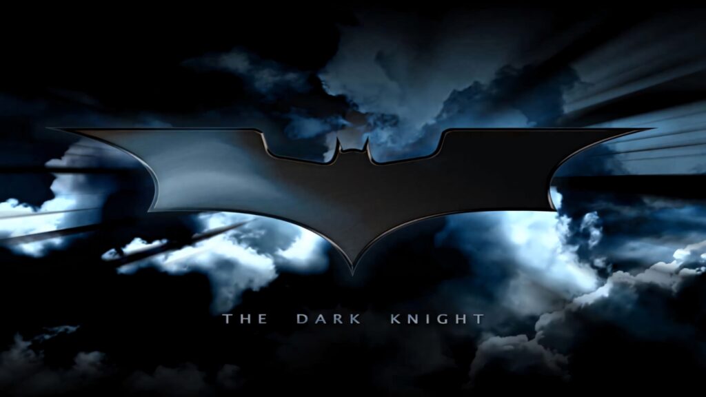 HD Dark Knight Bat Logo Wallpaper Against Dramatic Cloudy Sky
